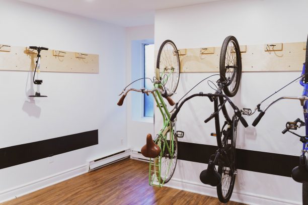 Bicycles hanging on the wall in a bicycle storage