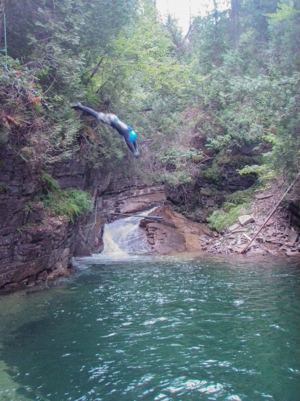 Someone dives into a canyon