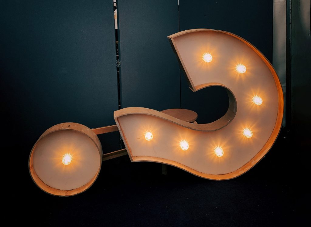 Illuminated sign of a question mark