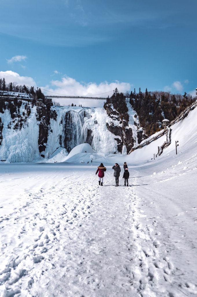 People walking towards the Montmorency Fall