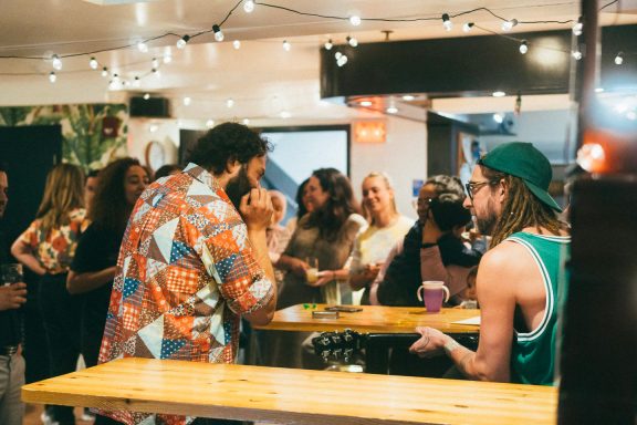 Group of people at the Montreal hostel bar