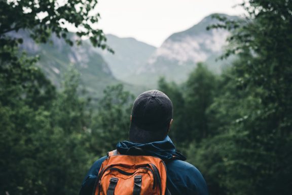 People from behind, in the forest