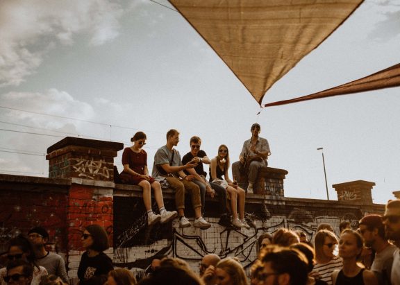 a group of people on a building roof