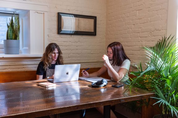 Two people in the coworking room