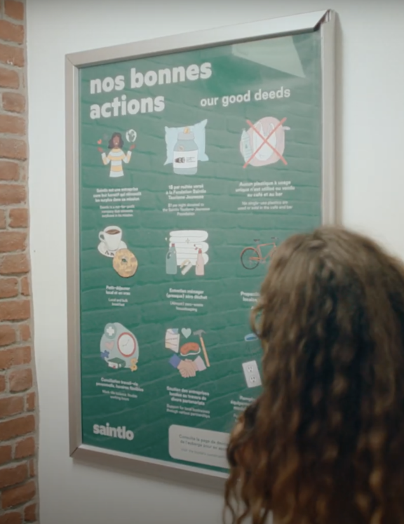 Poster of the good deeds the Saintlo Montréal Hostel is doing.